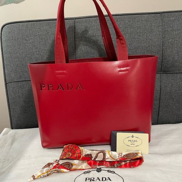 Prada Handbags - 🌟2X HP!!🌟 Prada Smooth Leather Cutout Logo Tote. Red.
